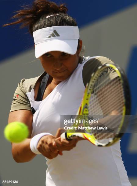 Sania Mirza of India in action against Magdalena Rybarikova of Slovakia during day Six of the AEGON Classic at the Edgbaston Priory Club on June 13,...