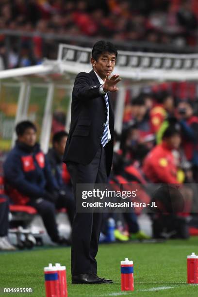 Head coach Masami Ihara of Avispa Fukuoka gestures during the J.League J1 Promotion Play-Off Final between Nagoya Grampus and Avispa Fukuoka at...