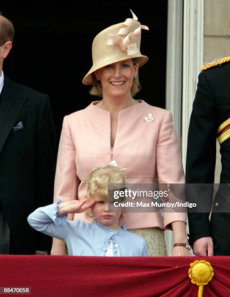 Lady Louise Windsor appears to salute as HRH Sophie Countess of Wessex stands on the balcony of Buckingham Palace during the annual event of the...