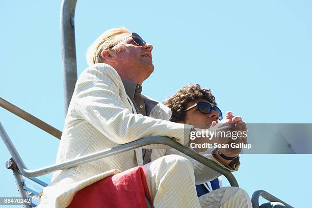 Former tennis star Boris Becker and his eldest son Noah ride a ski lift to the Boris Becker's wedding brunch reception at the El Paradiso mountain...