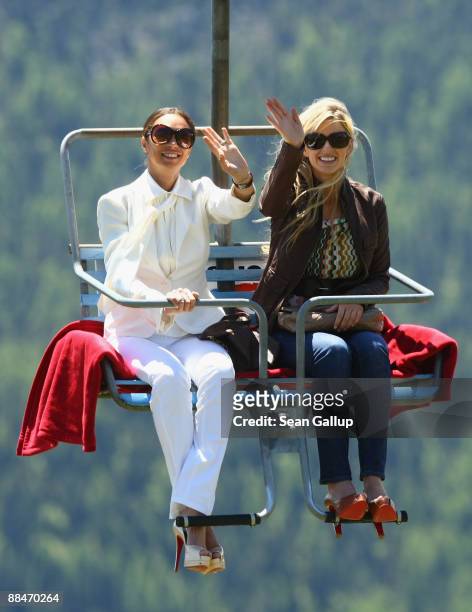 Sharlely Becker , new wife of former tennis star Boris Becker, and friend Judith Kamps ride a ski lift to the Beckers' wedding brunch reception at...