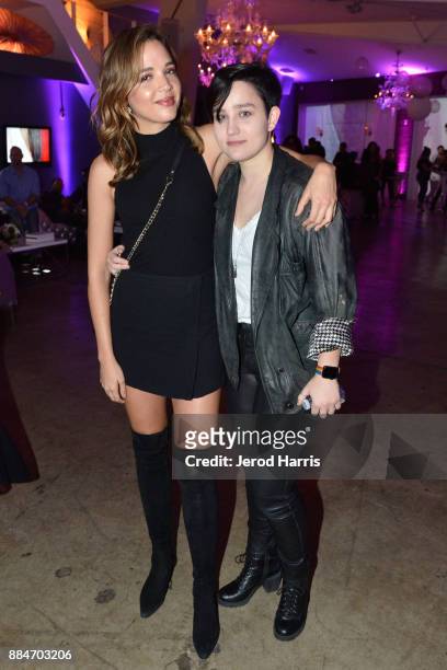 Georgie Flores and Bex Taylor-Klaus attend Dove Cameron x BELLAMI Launch Party at Unici Casa Gallery on December 2, 2017 in Culver City, California.