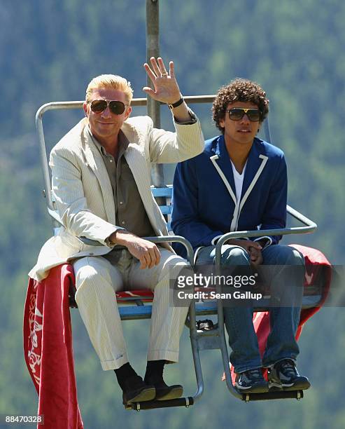 Former tennis star Boris Becker and his eldest son Noah ride a ski lift to Boris Becker's wedding brunch reception at the El Paradiso mountain...