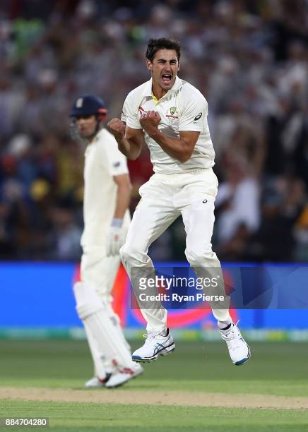 Mitchell Starc of Australia celebrates after taking the wicket of Mark Stoneman of England during day two of the Second Test match during the 2017/18...