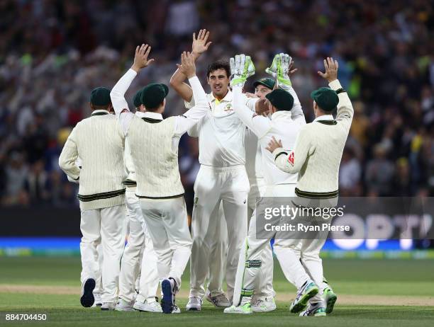 Mitchell Starc of Australia celebrates after taking the wicket of Mark Stoneman of England during day two of the Second Test match during the 2017/18...