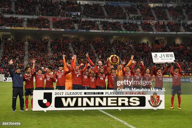 Nagoya Grampus players celebrate the promotion to the J1 after the scoreless draw in the J.League J1 Promotion Play-Off Final between Nagoya Grampus...