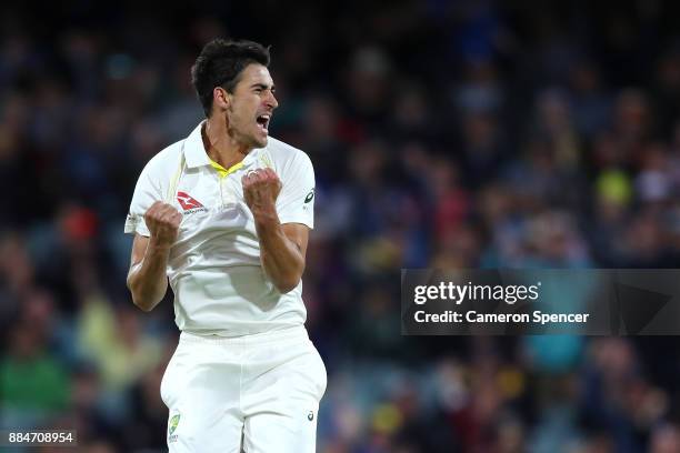 Mitchell Starc of Australia celebrates after taking the wicket of Mark Stoneman of England for lbw during day two of the Second Test match during the...