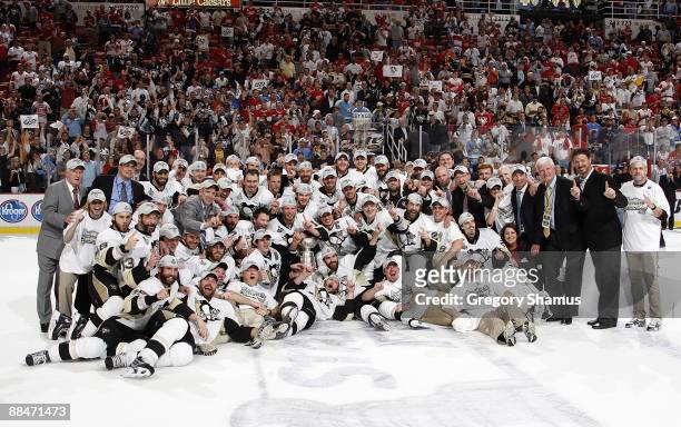 The Pittsburgh Penguins pose for their team photo with the Stanley Cup after defeating the Detroit Red Wings 2-1 in Game Seven of the 2009 Stanley...