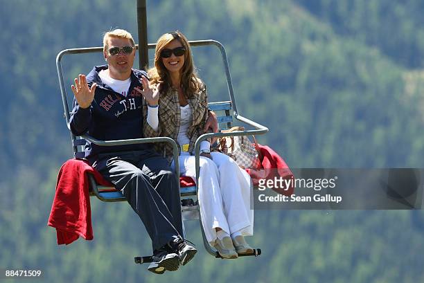 Former race car driver star Mika Hakkinen and his girlfriend Marketa Kromatova ride a ski lift to the wedding brunch reception of former tennis star...