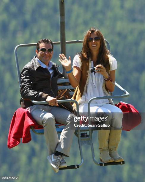 Former tennis star Carl-Uwe 'Charly' Steeb and his wife Kim Steeb ride a ski lift to the wedding brunch reception of former tennis star Boris Becker...
