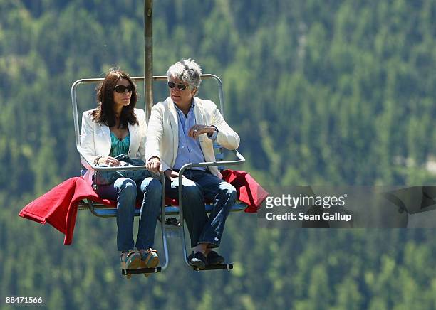 Sports television presenter Marcel Reif and his partner Marion Kiechle ride a ski lift to the wedding brunch reception of former tennis star Boris...