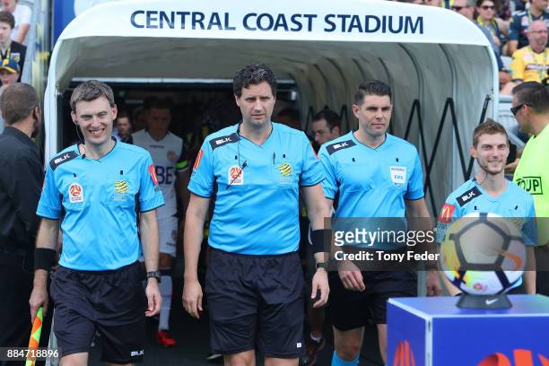 Referees enter the ground before the start of the match L-R Lance Greenshields Kris Griffith-Jones Shaun Evans and James Tesoriero during the round...