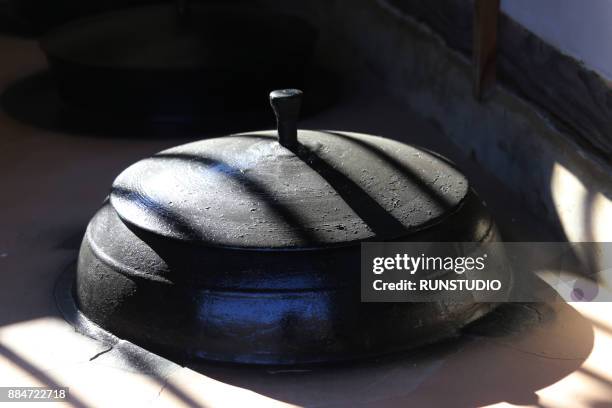 iron pot, it is called gamasot in korea - iron cauldron stock pictures, royalty-free photos & images