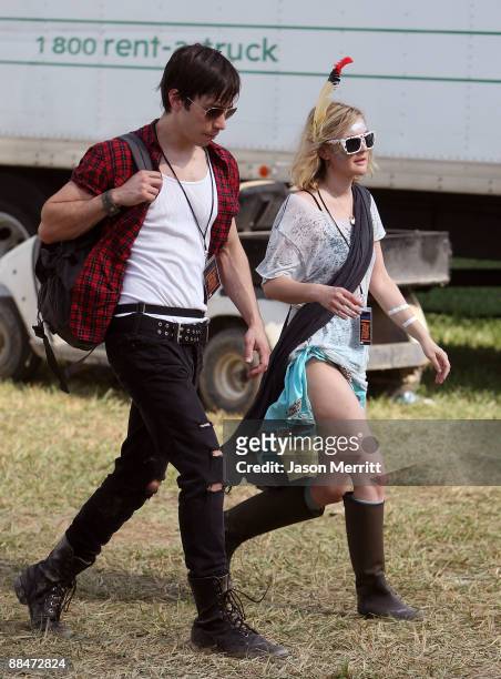 Actors Justin Long and Drew Barrymore attend Bonnaroo 2009 on June 13, 2009 in Manchester, Tennessee.