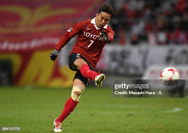 Taishi Taguchi of Nagoya Grampus shoots at goal during the J.League J1 Promotion Play-Off Final between Nagoya Grampus and Avispa Fukuoka at Toyota...