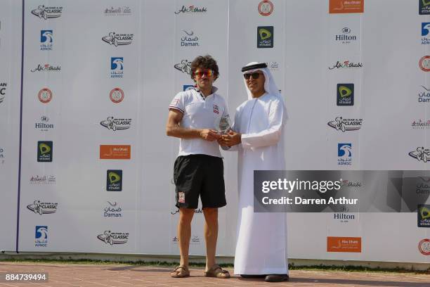 Roberto Ferrari accepts his trophy for finishing 3rd during the Abu Dhabi - Al Ain Classic on December 3, 2017 in Abu Dhabi, Unite
