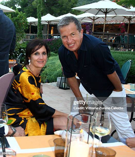 Maria Grazia Chiuri and Mario Testino attend Il Pellicano Summer Party with Jurgen Teller held at the Hotel Il Pellicano on June 13, 2009 in Porto...