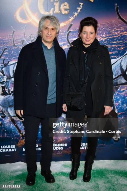 Producers Alain Goldman and Sidonie Dumas attend the "Santa & Cie" Paris Premiere at Cinema Pathe Beaugrenelle on December 3, 2017 in Paris, France.