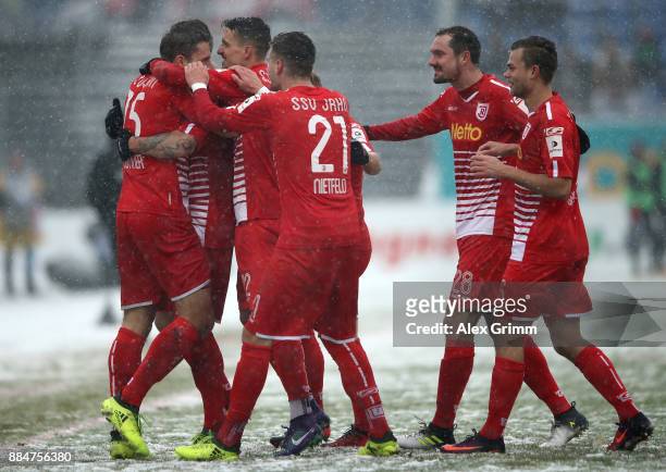 Marco Gruettner of Regensburg celebrate with his team mates after he scores the opening goal during the Second Bundesliga match between SV Darmstadt...