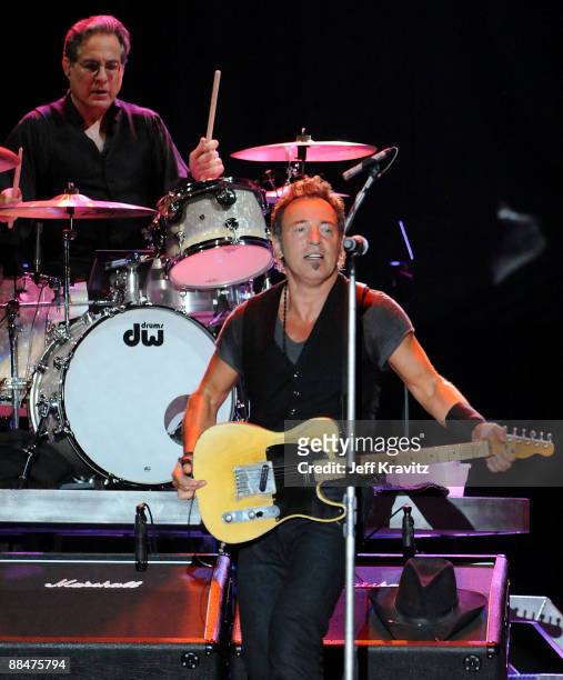 Drummer Max Weinberg and Bruce Springsteen of the E Street Band perform on stage during Bonnaroo 2009 on June 13, 2009 in Manchester, Tennessee.