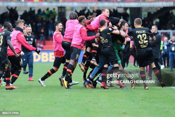 Benevento's players celebrate at the end of the Italian Serie A football match Benevento Calcio vs AC Milan on December 3, 2017 at the Ciro Vigorito...