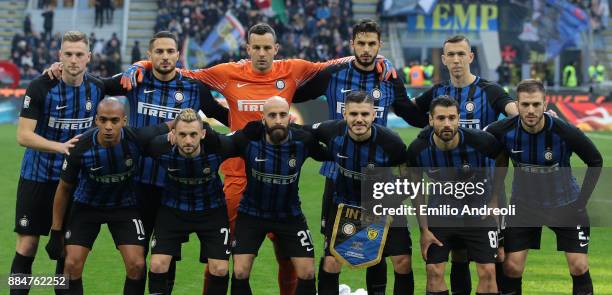 Internazionale Milano team line up before the Serie A match between FC Internazionale and AC Chievo Verona at Stadio Giuseppe Meazza on December 3,...