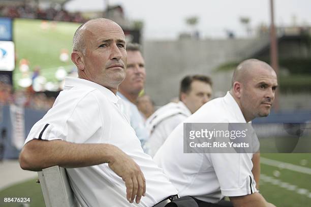 Houston Dynamo head coach Dominic Kinnear and assistant coach John Spencer watch the action during a game between the Houston Dynamo and FC Dallas at...