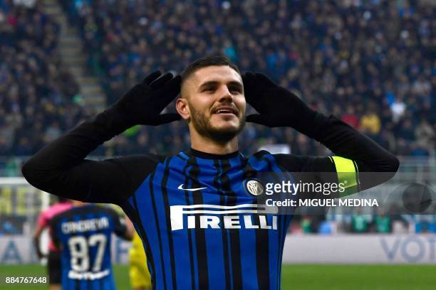 Inter Milan's captain Mauro Icardi from Argentina, celebrates after scoring during the Italian Serie A football match Inter vs Chievo on December 3,...
