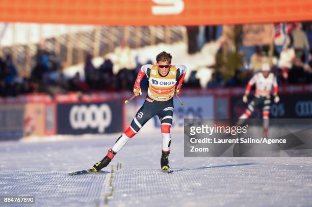 Johannes Hoesflot Klaebo of Norway takes 1st place during the FIS Nordic World Cup Men's and Women's Cross Country Skiathlon on December 3, 2017 in...