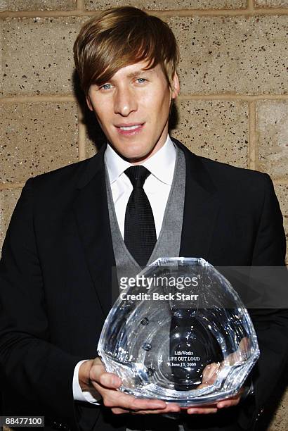 Oscar winner Dustin Lance Black accepts an award at Life Out Loud 4 at Sunset Gower Studios on June 13, 2009 in Hollywood, California.