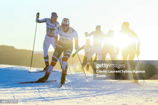 Lotta Udnes Weng of Norway competes, Aino-kaisa Saarinen of Finland competes during the FIS Nordic World Cup Men's and Women's Cross Country...