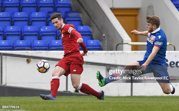 Corey Whelan of Liverpool and Oliver Shenton of Stoke City in action during the Liverpool v Stoke City Premier League Cup game at The Swansway...