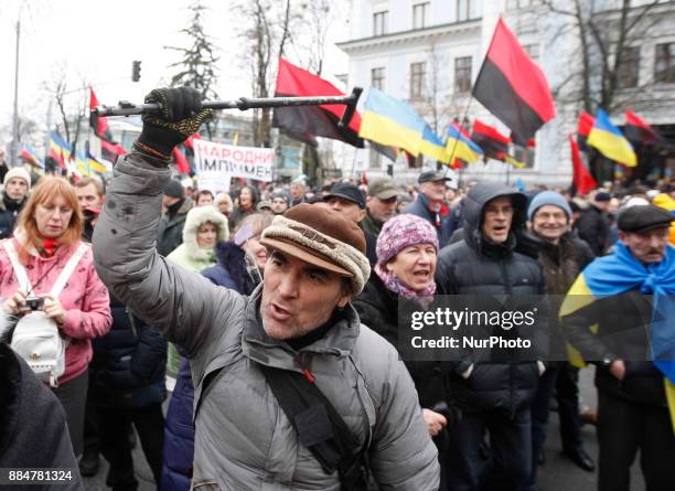 Ukrainians take part in the &quot;March for Impeachment&quot; in Kiev, Ukraine, 03 December, 2017. Protestors demand Ukrainian parliament to accept a...