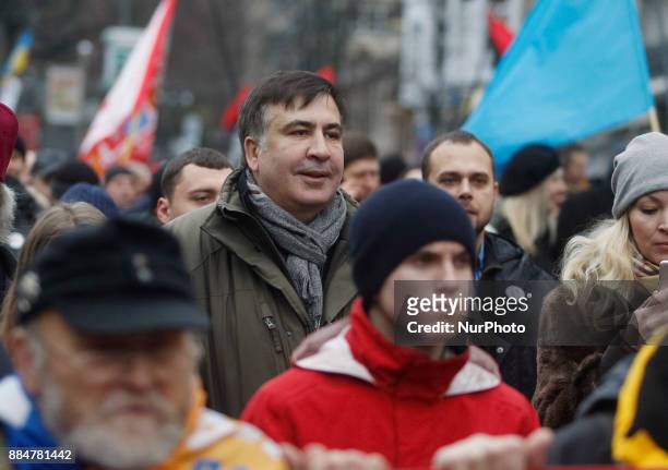 Mikheil Saakashvili , former Georgian President and Odessa governor, takes part with his supporters in &quot;March for Impeachment&quot; in Kiev,...