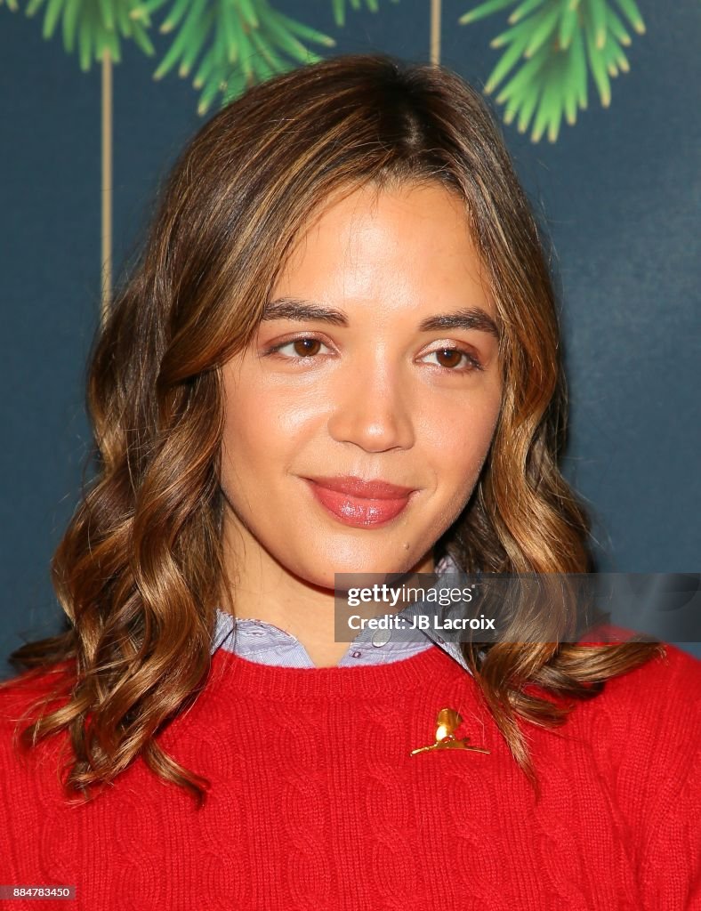 Georgie Flores attends the Brooks Brothers holiday celebration with