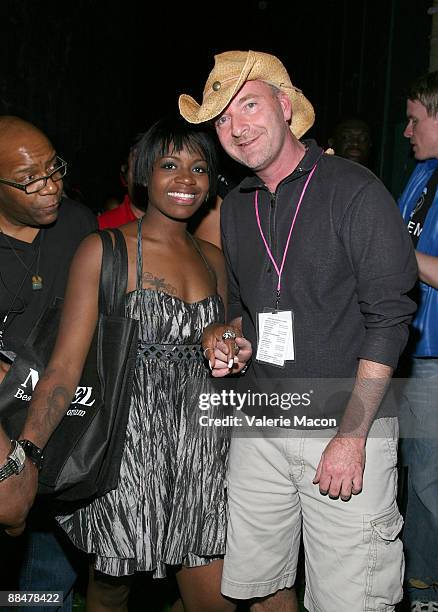 Singer Fantasia poses with Christopher Street West Rodney Scott at the LA Pride Festival on June 13, 2009 in West Hollywood, California.