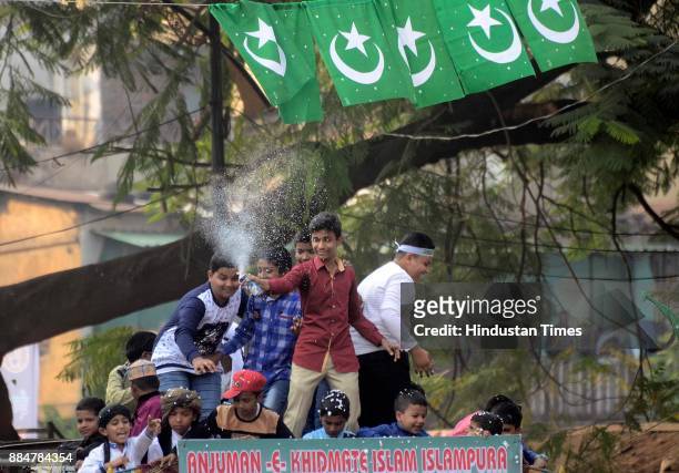 Muslim devotees take part in a procession during Eid Milad-Un-Nabi - the birth anniversary of Prophet Muhammad - the founder of Islam, also believed...