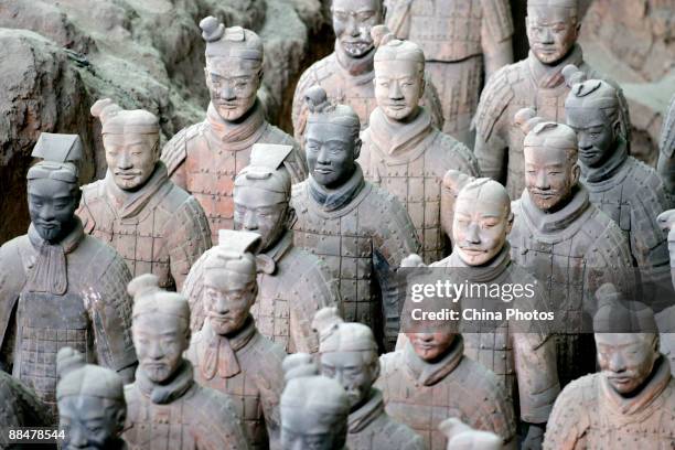 Terracotta Warriors excavated 24 years ago are seen at the No.1 pit of the Qin Shihuang Terracotta Warriors and Horses Museum on June 13, 2009 in...