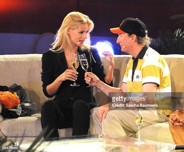 Otto Waalkes and Michelle Hunziker drink champagne during the Wetten Dass...? Summer Edition on June 13, 2009 in Palma de Mallorca, Spain.