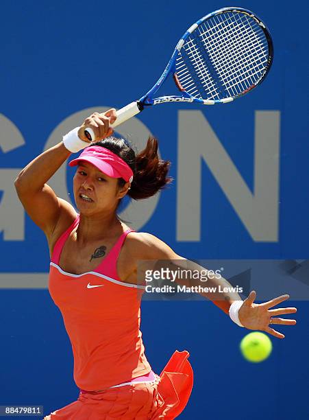 Na Li of China in action against Magdalena Rybarikova of Slovakia during day Seven of the AEGON Classic at the Edgbaston Priory Club on June 14, 2009...