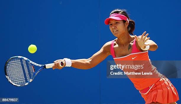 Na Li of China in action against Magdalena Rybarikova of Slovakia during day Seven of the AEGON Classic at the Edgbaston Priory Club on June 14, 2009...