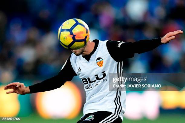 Valencia's Spanish defender Jose Luis Gaya Pena controls the ball during the Spanish league football match Getafe CF vs Valencia CF at the Col....