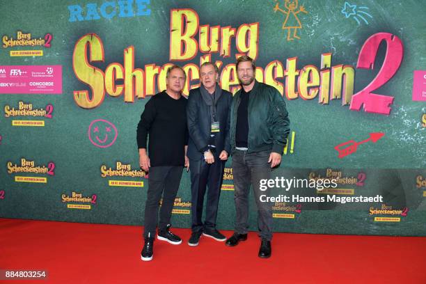 Actor Uwe Ochsenknecht, Ralf Huettner and Henning Baum during the 'Burg Schreckenstein 2' Premiere at Mathaeser Filmpalast on December 3, 2017 in...