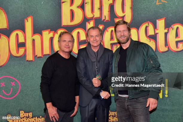 Actor Uwe Ochsenknecht, Ralf Huettner and Henning Baum during the 'Burg Schreckenstein 2' Premiere at Mathaeser Filmpalast on December 3, 2017 in...