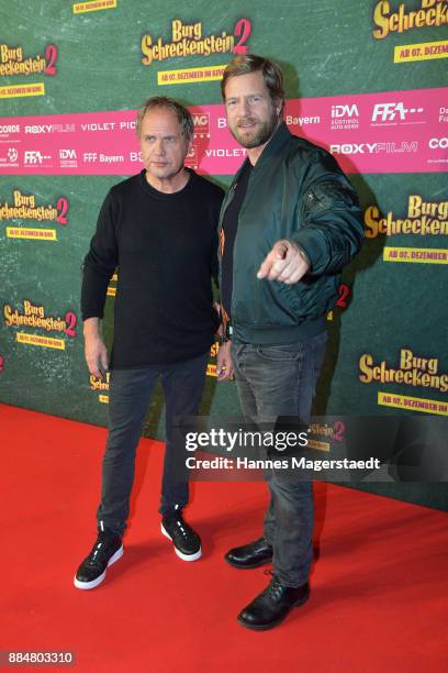 Actor Uwe Ochsenknecht and Henning Baum during the 'Burg Schreckenstein 2' Premiere at Mathaeser Filmpalast on December 3, 2017 in Munich, Germany.