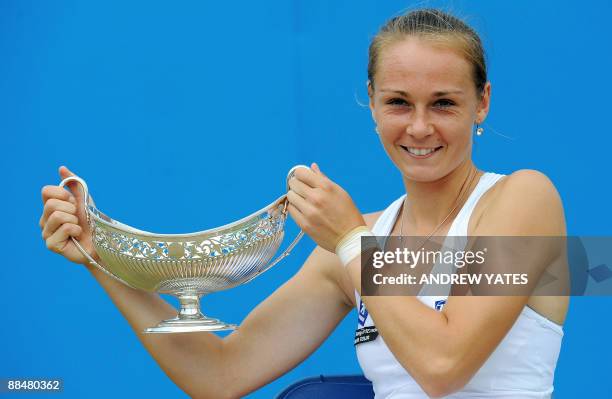 Magdalena Rybarikova of Slovakia holds the Maud Watson trophy after winning the WTA AEGON classic tennis tournament final at Edgbaston Priory in...