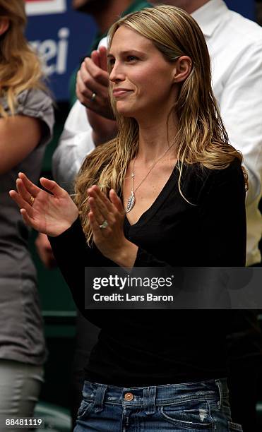 Sara Foster, girlfriend of Tommy Haas, who won the final of the Gerry Weber Open against Novak Djokovic of Serbia, applauds at the Gerry Weber...