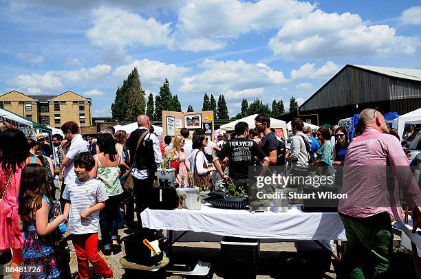 General view of the Vauxhall Art Car Boot Fair at Old Truman Brewery on June 14, 2009 in London, England. The annual Vauxhall Art Car Boot Fair, now...