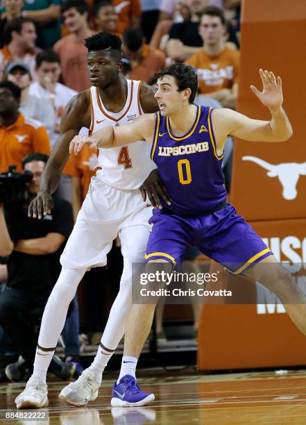 Mohamed Bamba of the Texas Longhorns plays defense against Rob Marberry of the Lipscomb Bisons at the Frank Erwin Center on November 18, 2017 in...