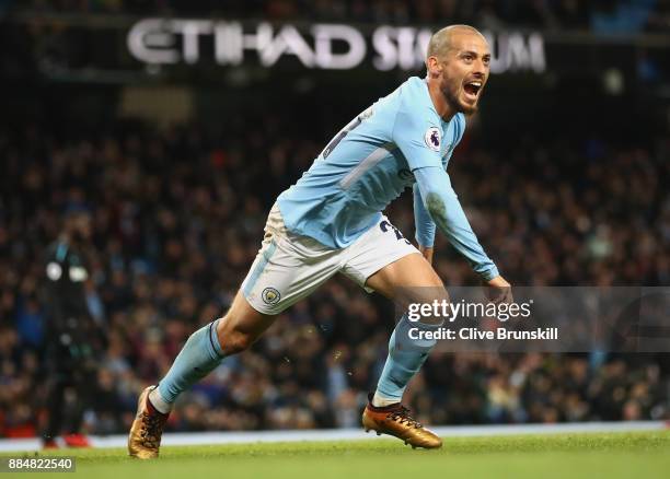 David Silva of Manchester City celebrates scoring his sides second goal during the Premier League match between Manchester City and West Ham United...